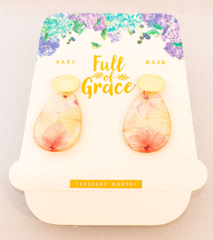 Aretes con flores naturales. Producto 100% hecho a mano. Una joya de la flora colombiana.