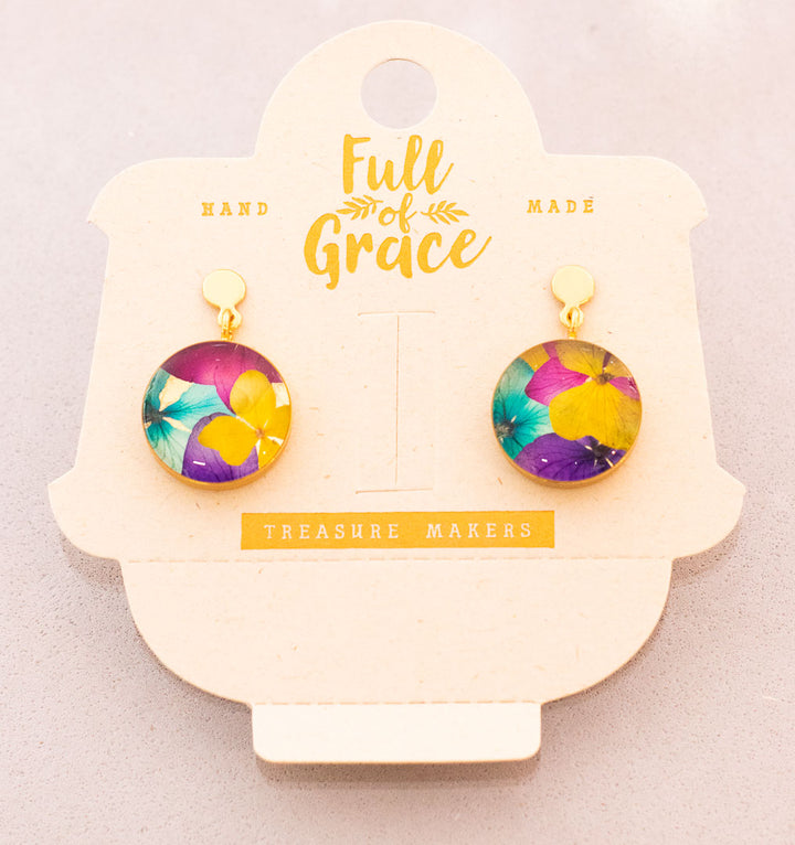 Aretes con flores naturales. Producto 100% hecho a mano. Una joya de la flora colombiana.